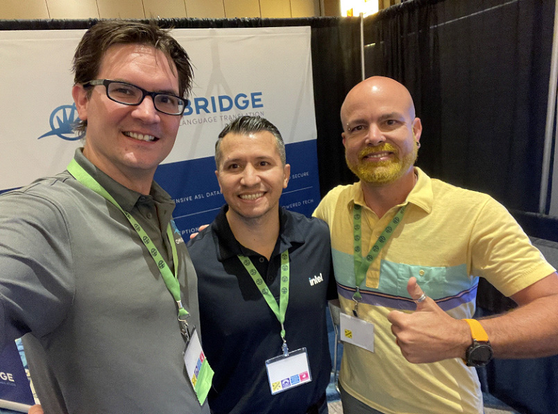 Adam and Randall from the OmniBridge team posing with engineer Brenden Gilbert from Meta